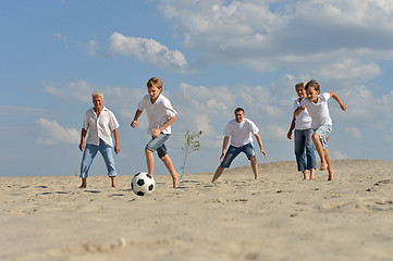 Image showing Family playing football