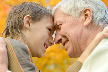 Image showing Old man with grandson.