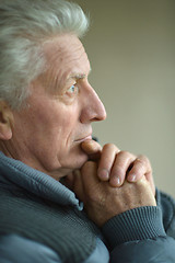 Image showing Thinking elderly man