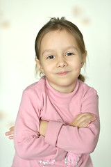 Image showing emotional little girl at home