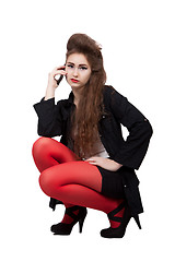 Image showing Teenage girl in black and red clothes