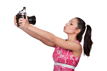 Image showing Retro girl in a pink dress