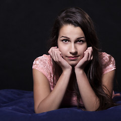 Image showing Young woman in pink mini dress