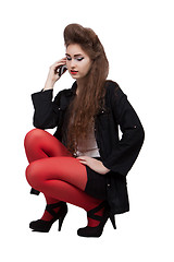 Image showing Teenage girl in black and red clothes