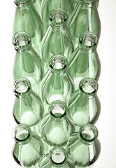 Image showing Top view empty glass bottles for wine or beer isolated