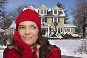 Image showing Smiling Mixed Race Woman in Winter Clothing Outside in Snow