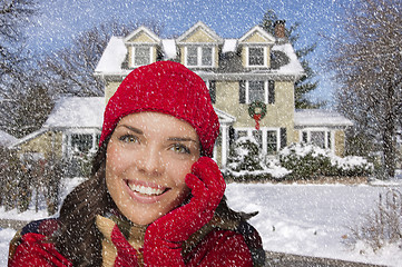 Image showing Smiling Mixed Race Woman in Winter Clothing Outside in Snow