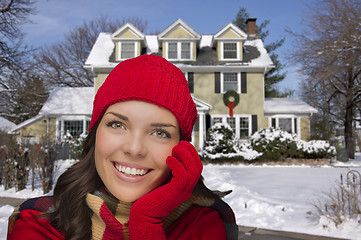 Image showing Smiling Mixed Race Woman in Winter Clothing Outside in Snow