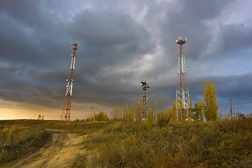 Image showing phone towers against the evening sky