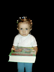 Image showing The girl with the book