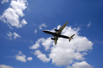 Image showing Airliner and clouds