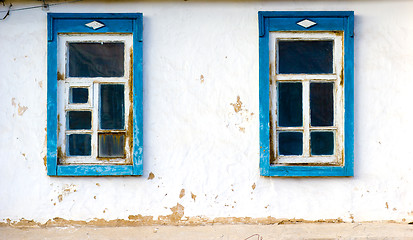 Image showing two windows old clay wall