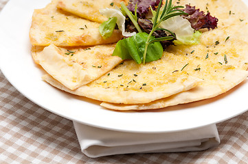 Image showing garlic pita bread pizza with salad on top