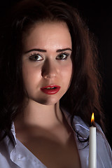 Image showing Woman with burning candle