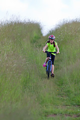 Image showing Teens girl on bike