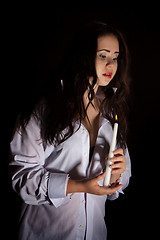 Image showing Woman with burning candle