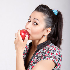 Image showing woman eat red apple