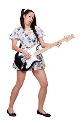 Image showing A girl with pigtails in colorful retro dress