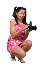 Image showing Retro girl in a pink dress