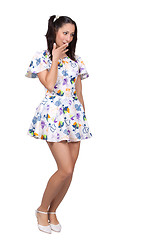 Image showing A girl with pigtails in colorful retro dress