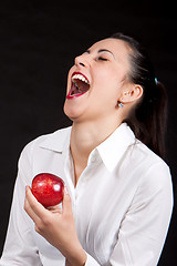 Image showing woman eat red apple