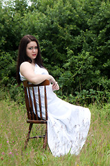 Image showing Woman on old chair