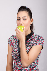 Image showing woman eat green apple