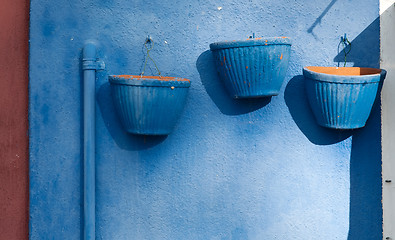 Image showing three blue flowerpots