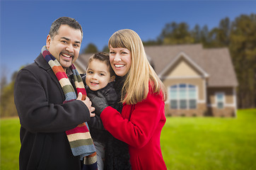 Image showing Happy Mixed Race Family in Front of House