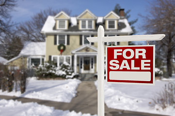 Image showing Home For Sale Sign in Front of Snowy New House