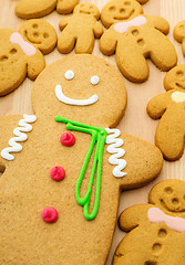 Image showing Traditional gingerbread cookies on wooden background