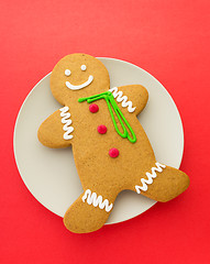 Image showing Gingerbread man on red background