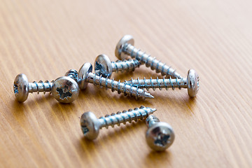 Image showing Screws on wood