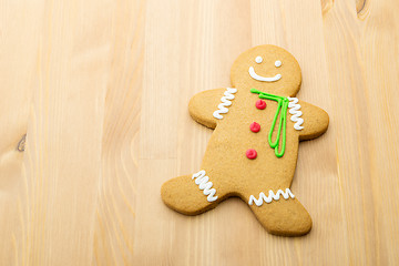 Image showing Gingerbread man over the wooden background