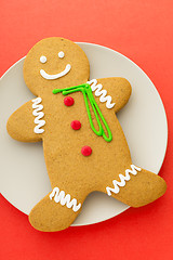 Image showing Gingerbread with red background