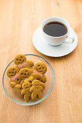 Image showing Gingerbread man with coffee