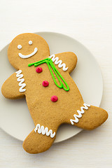 Image showing Gingerbread man cookies on white plate