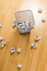 Image showing Trash bin and paper ball