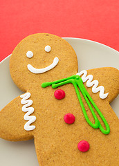 Image showing Gingerbread man on red background