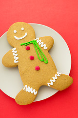 Image showing Gingerbread cookie with red background