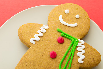 Image showing Gingerbread with red background