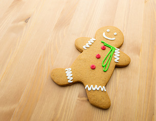 Image showing Gingerbread man on wooden background