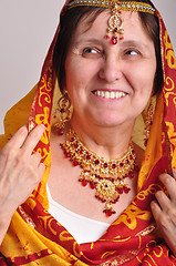 Image showing senior woman in traditional Indian clothing and jeweleries