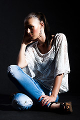 Image showing Long-haired woman in white gauze blouse