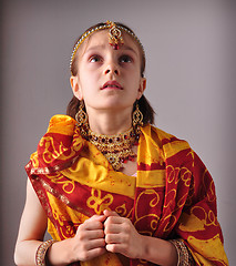 Image showing little girl in traditional Indian sari and jeweleries