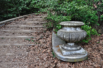 Image showing vintage staircase covered with brown leaves