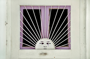 Image showing metal sun pattern on vintage door