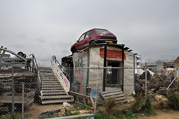 Image showing rusty car and scrap metal