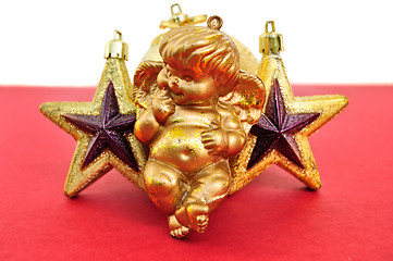 Image showing angel and golden christmas stars