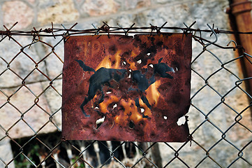 Image showing rusty beware of the dog sign